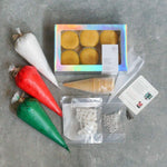 Load image into Gallery viewer, Christmas Tree and Santa Hat Cupcakes
